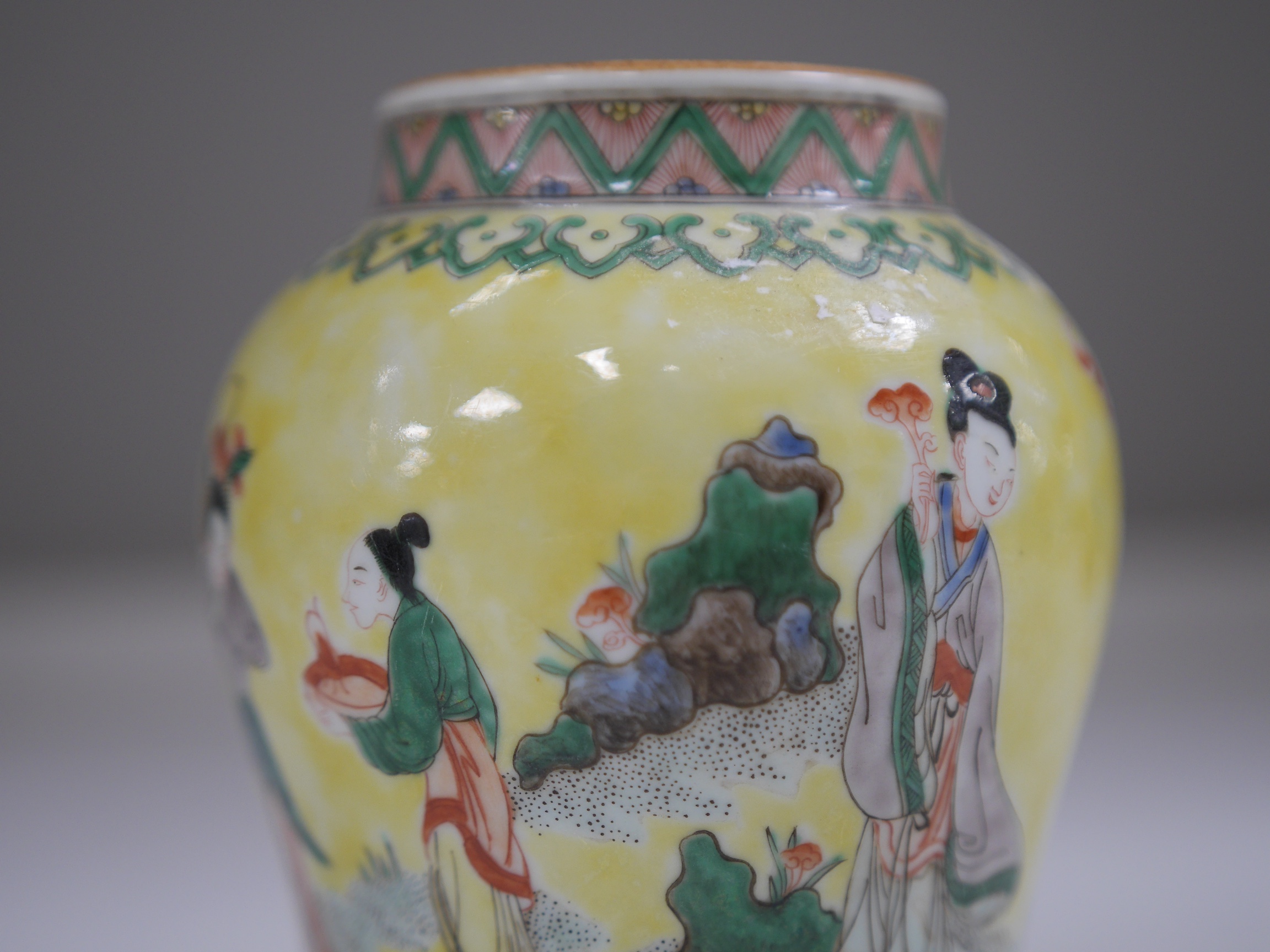 A Chinese yellow ground figurative vase, 15.5cm high. Condition - good